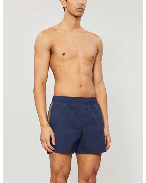 blue gucci swim shorts|gucci men swimsuit.